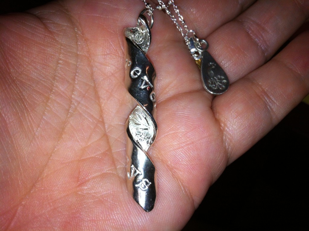 pretty peacock in hand